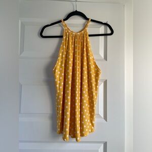 Yellow and white polka dot tank top